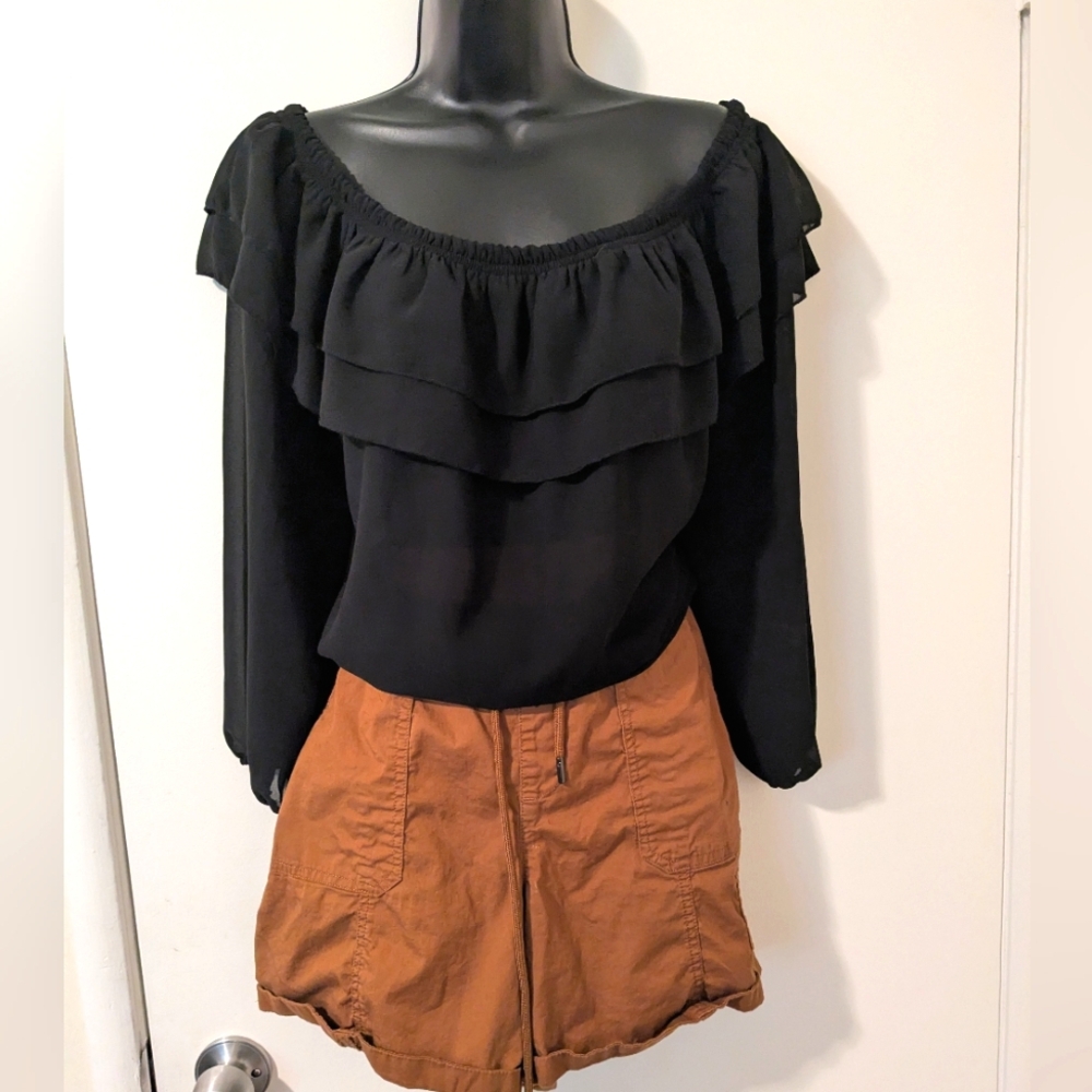 Black Ruffled Blouse with Brown Shorts